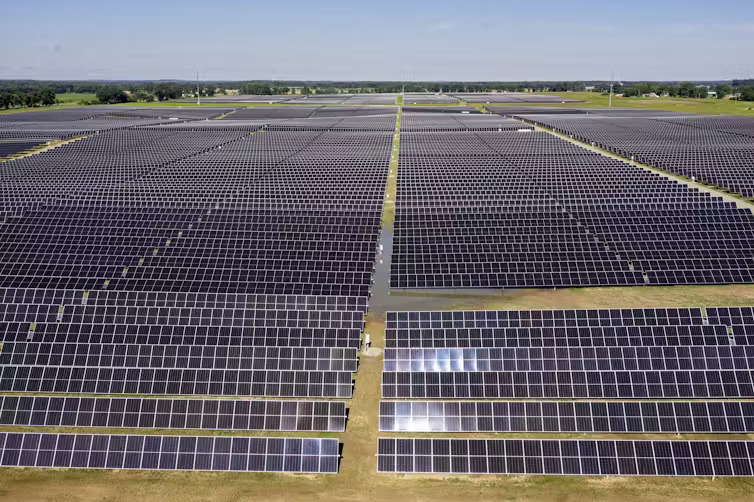 A wide view of a large area covered in solar panels.