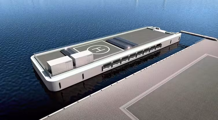 A diagram shows a floating barge tethered to a pier, with shipping containers, solar panels and a helipad.
