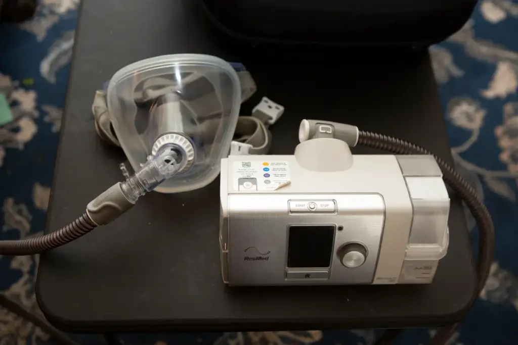 A medical device used for obstructive sleep apnea sits on a table.